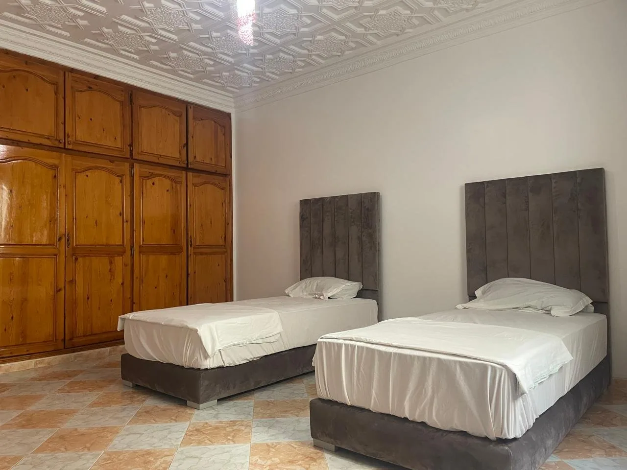 Appartement 1er Étage à Saïdia — deuxième chambre avec deux lits simples